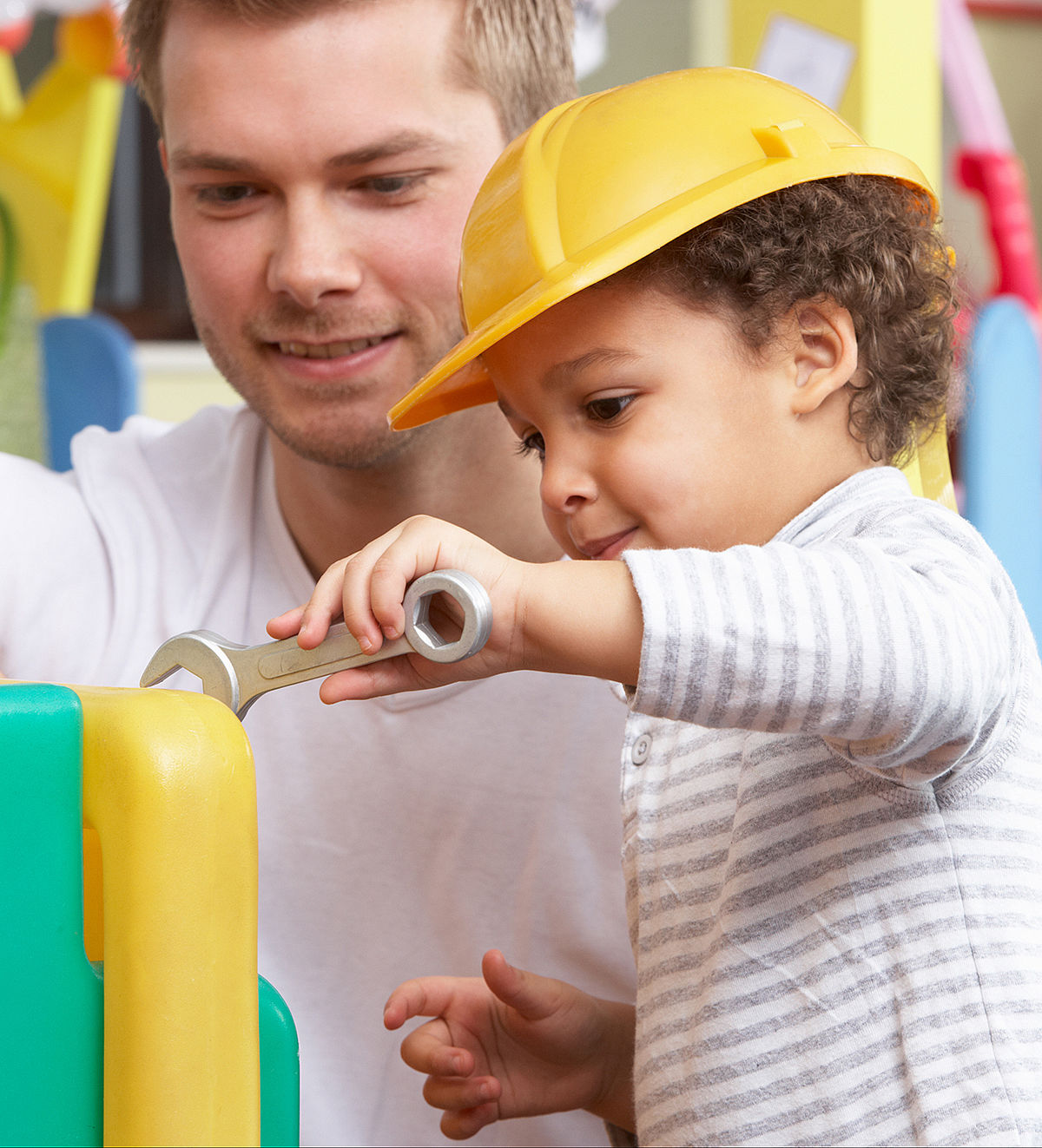 Man with children playing together